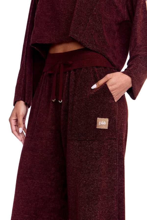 Calça Pantalona Estonada Com Bolso Athleisure Macadâmia